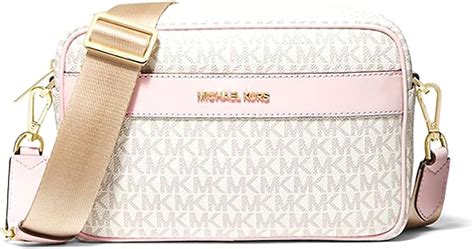 michael kors crossbody with tech attached mk signature powder pink|michael kors crossbody monogram.